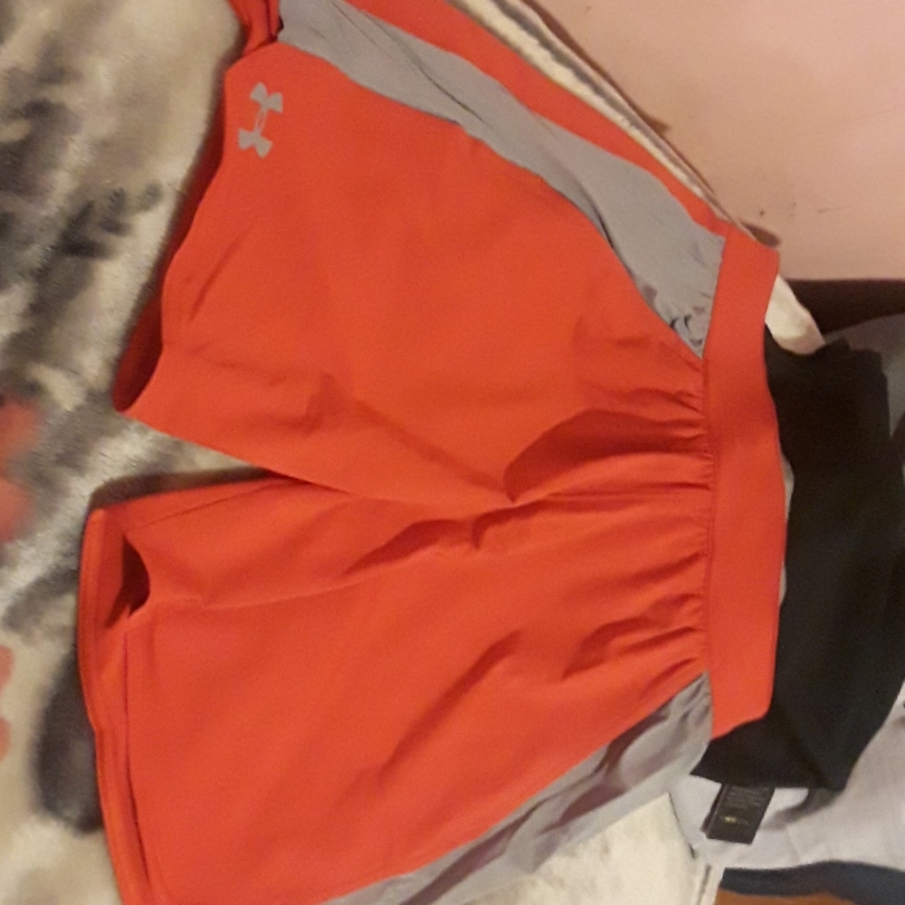 Women Under Armour red gray shorts